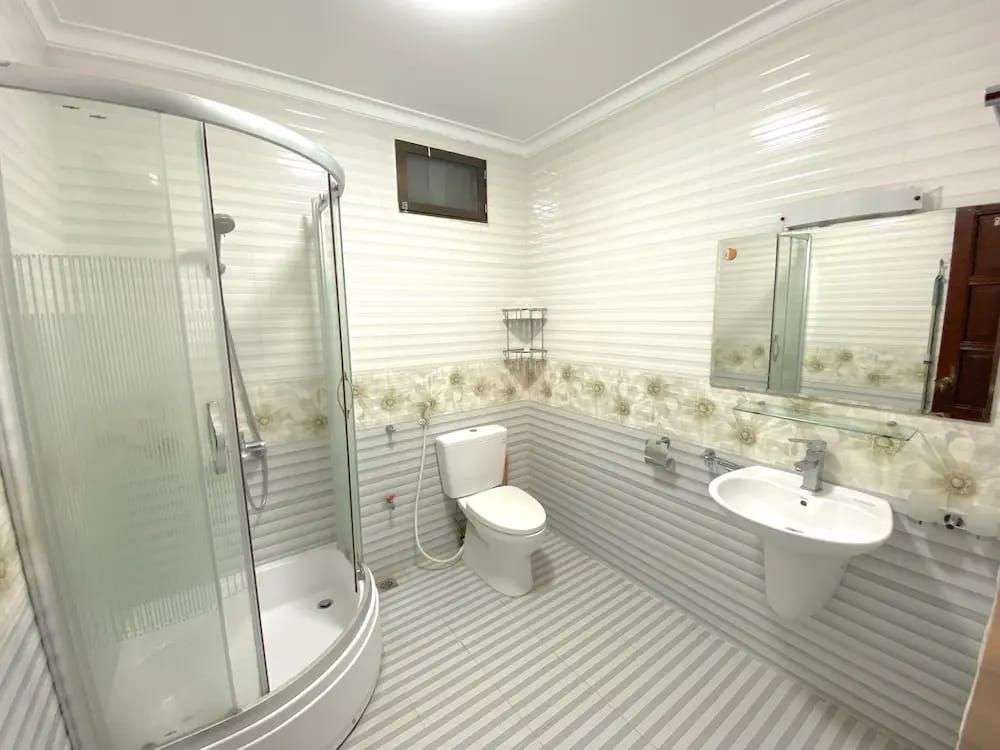 Private dedicated bathroom next to the room