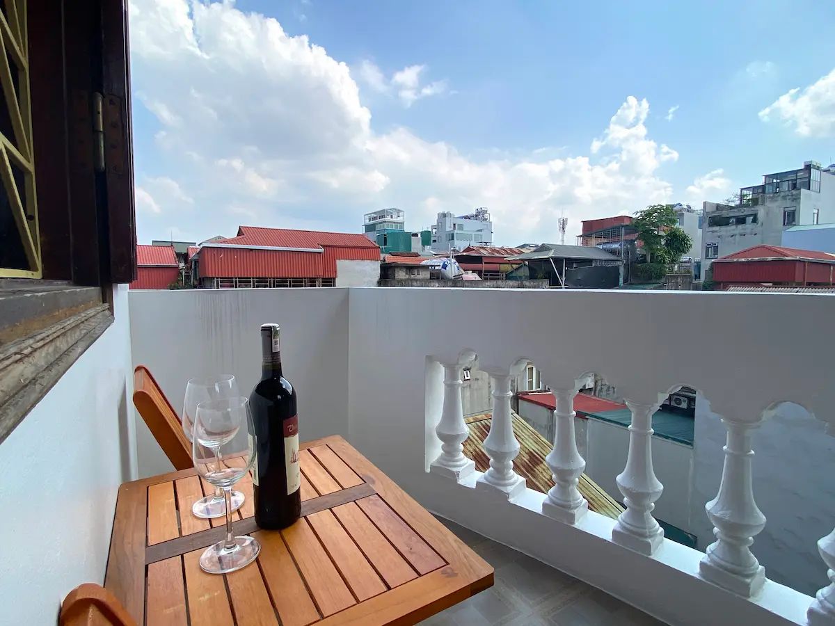 Private balcony with open city views and fresh air.